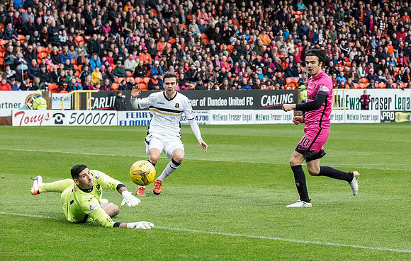 Scott Fraser from Dundee Utd makes it 2-1 against Dumbarton to seal the victory for the home team
