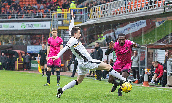 Obadeyi from Dundee Utd  fouled against Dumbarton at Tannadice